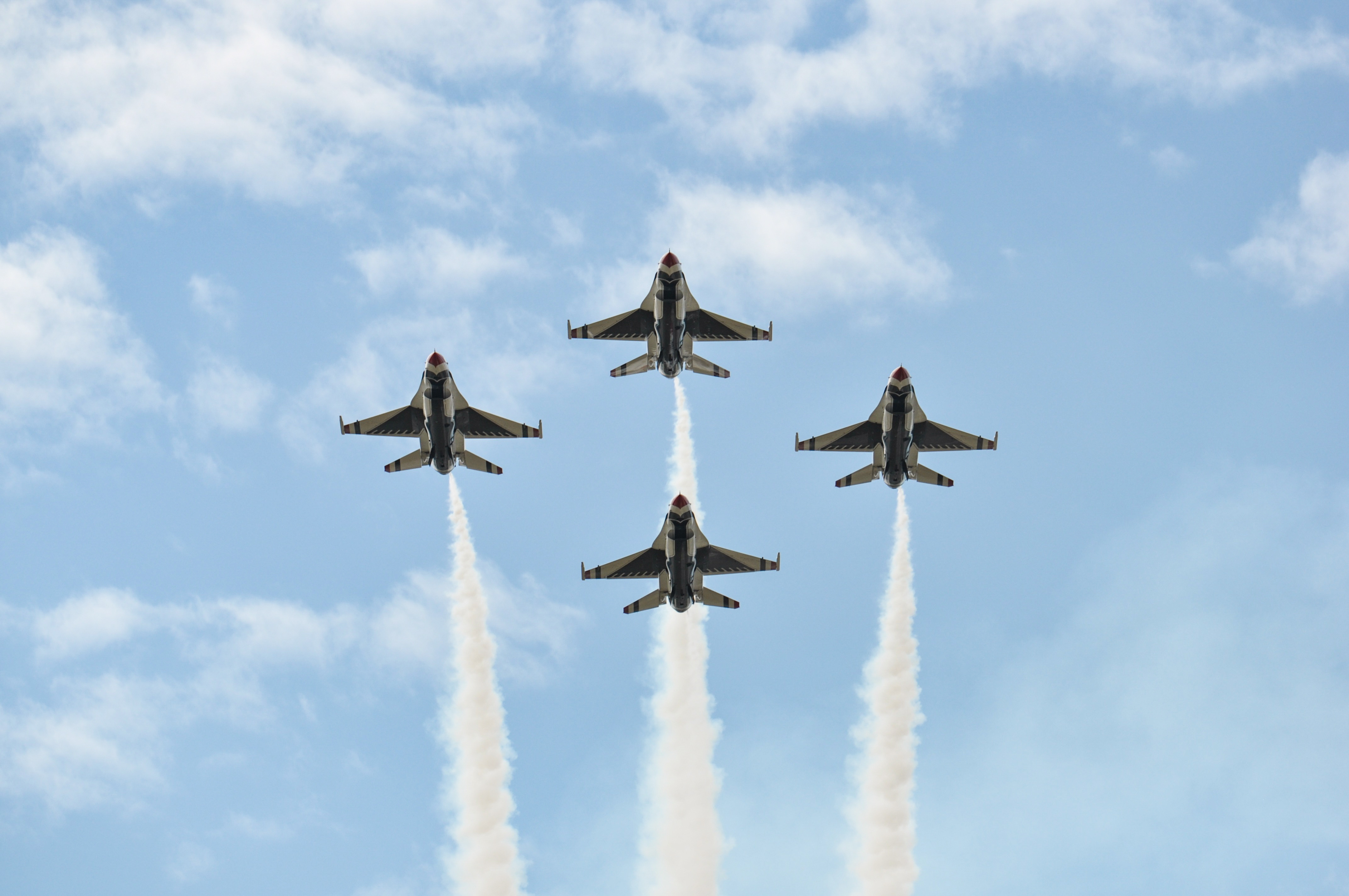 Four airforce jets flying