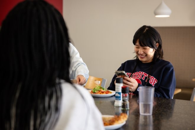 students with food at the table